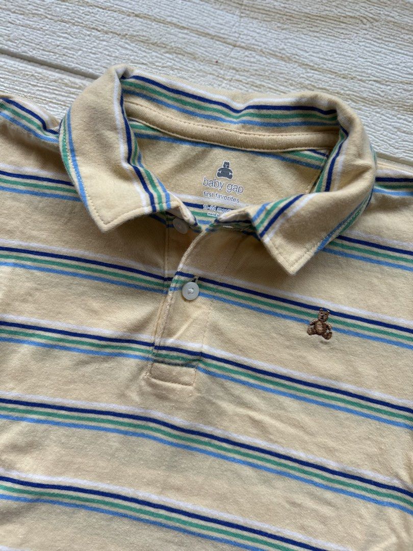 Baby Gap Polo romper (Category: Babies & Kids Fashion) located in Cebu City. Submitted by yjainani (Listing ID 1470439470, Image 2). Description: babyGap striped polo romper in yellow featuring a small embroidered Brannan Bear logo on the chest.