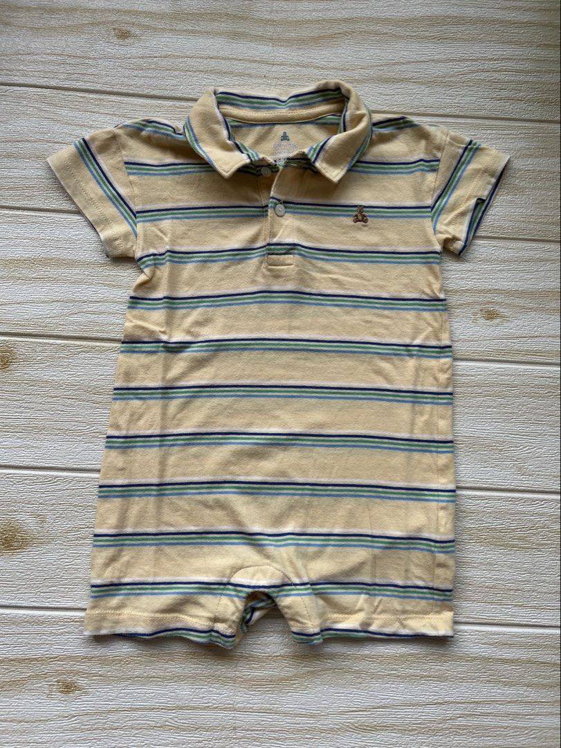 Baby Gap Polo romper (Category: Babies & Kids Fashion) located in Cebu City. Submitted by yjainani (Listing ID 1470439470, Image 1). Description: babyGap striped polo romper in yellow featuring a small embroidered Brannan Bear logo on the chest.