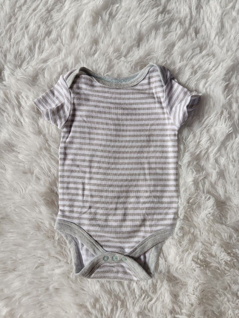 Baby Short sleeve Onesies (Category: Babies & Kids Fashion) located in Orani. Submitted by mbfb_btn (Listing ID 1470432062, Image 1). Description: - Bundle of short-sleeve baby onesies in standard infant sizing 0-3 months - 50 each (can give 3 for 100 if you buy in bundles) - Includes assorted designs: striped, plain ribbed grey, teddy bear print, elephant & turtle print, and a white one with a blue/orange monster patch - Made from soft, breathab