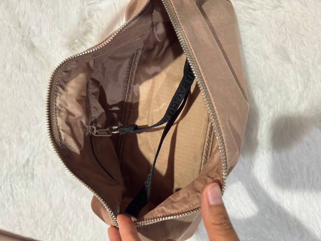 Baggu Loaf Bag (Category: Shoulder Bags) located in Bulacan. Submitted by cheeryfatima (Listing ID 1470441975, Image 2). Description: Baggu Loaf Bag Bought for 3,850 and used only once. Still in excellent condition. • Selling price: ₱2,000 • Barely used, good condition • Color: Toasted Almond RFS: Decluttering / no longer using it. PM me if interested..