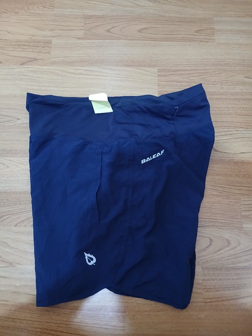 Baleaf Blue Athletic Running Shorts with Zip Pocket (Category: Shorts) located in General Santos City (Dadiangas). Submitted by afsph1996 (Listing ID 1470460452, Image 3). Description: - Brand: Baleaf - Color: Royal Blue - Size: L -Waistline 30-34 -Length 15 - High waistband design for added support - Secure back zipper pocket for essentials - Reflective logo for night visibility - Lightweight and breathable fabric - Ideal for running, gym workou