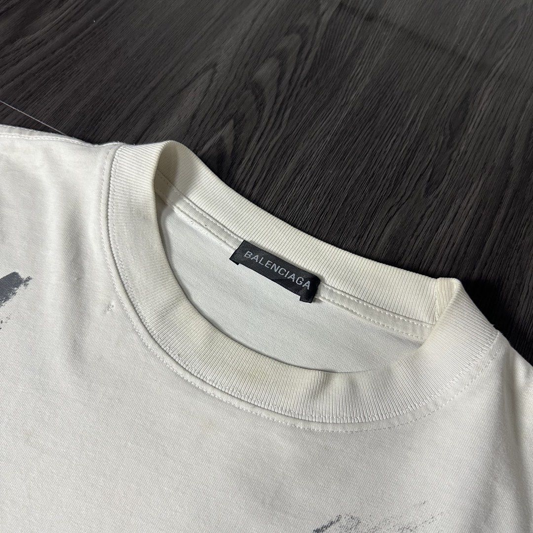 BALENCIAGA (Category: Formal Shirts) located in San Jose del Monte. Submitted by xanthrift2.0 (Listing ID 1470456678, Image 3). Description: BALENC*AGA DIRTY WHITE TEE color rate: 9.7/10 dimes: 24 x 27 (boxy type large to xl) ₱849.