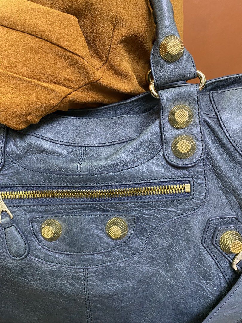 Balenciaga (Category: Purses & Pouches) located in Buhi. Submitted by nyleeshop0.0 (Listing ID 1470524897, Image 3). Description: Balenciaga Big studs - no code like new condition actual color blueish grey all details in photo Msg for further inquiry if any Price + Sf .