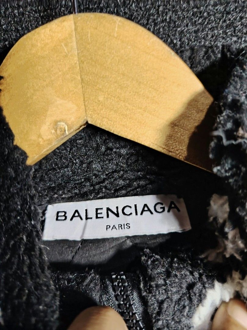 Balenciaga All Over Logo Fleece Jacket (Category: Coats, Jackets and Outerwear) located in Baguio. Submitted by tabuzomaria1422 (Listing ID 1470486473, Image 3). Description: - Authentic Balenciaga fleece jacket - Color: Black with all-over white logo print - Material: Heavy fuzzy texture with quilted black lining - Features: Stand-up collar, full zip closure, and inner tag with style code - Fit: Relaxed fit, exceptionally warm for winter - Origi