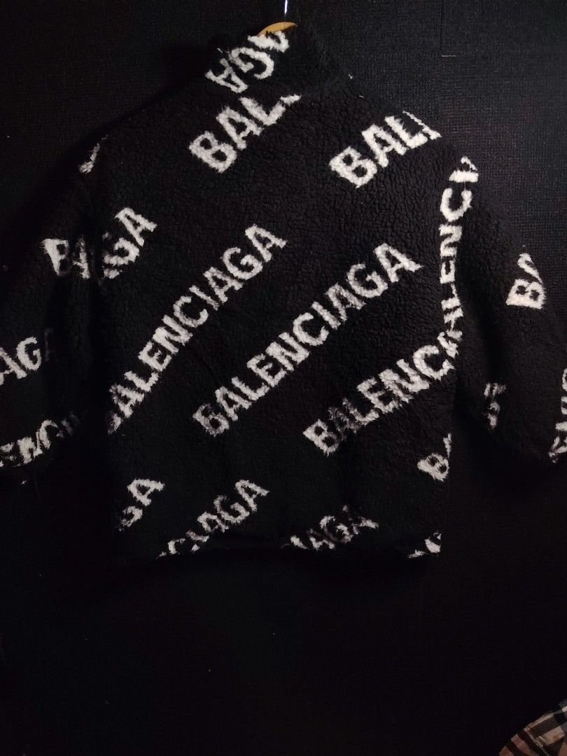 Balenciaga All Over Logo Fleece Jacket (Category: Coats, Jackets and Outerwear) located in Baguio. Submitted by tabuzomaria1422 (Listing ID 1470486473, Image 2). Description: - Authentic Balenciaga fleece jacket - Color: Black with all-over white logo print - Material: Heavy fuzzy texture with quilted black lining - Features: Stand-up collar, full zip closure, and inner tag with style code - Fit: Relaxed fit, exceptionally warm for winter - Origi