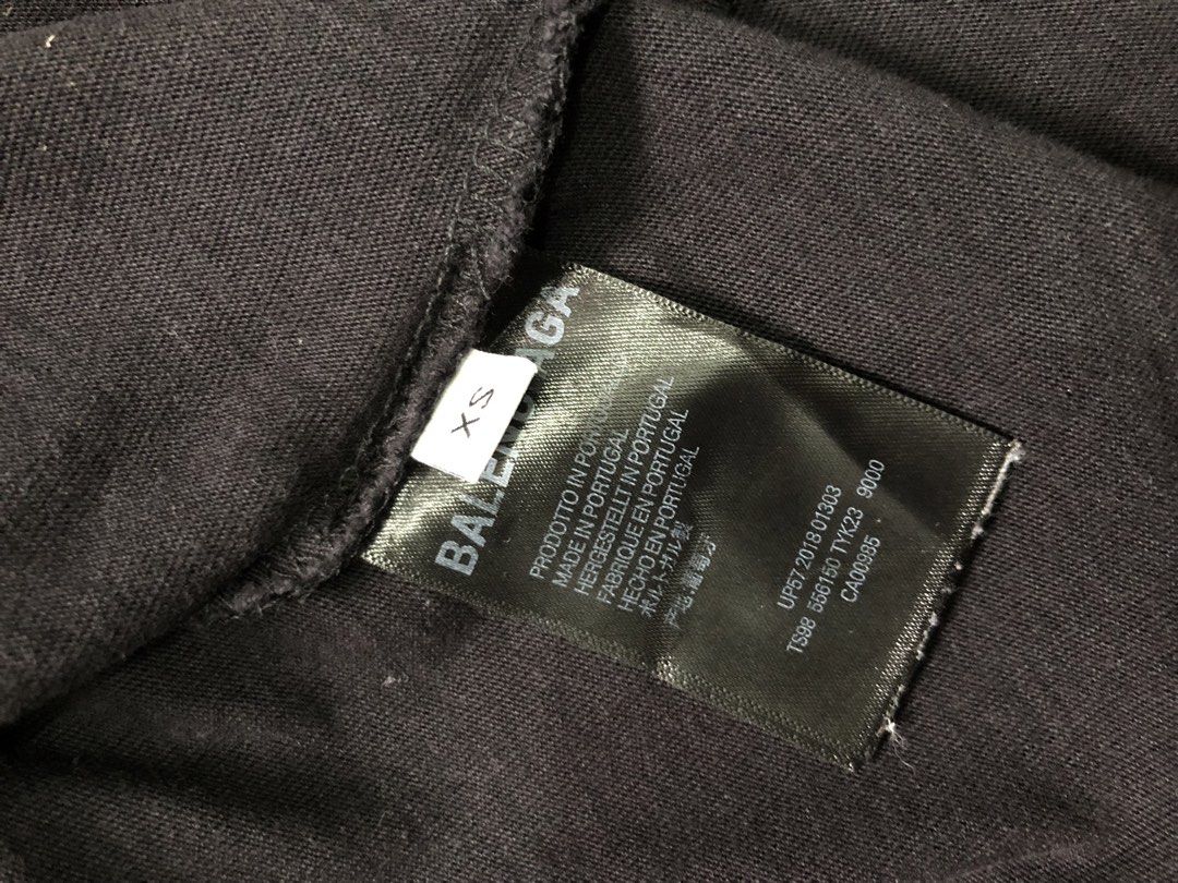 Balenciaga BB Logo Oversized Tee Black (Category: Shirts) located in Manila. Submitted by purewater.2554df (Listing ID 1470499003, Image 3). Description: - Authentic Balenciaga black t-shirt - Size: Extra Small (XS) - Material: Premium heavy cotton - Design: White BB logo graphic on the chest - Details: Crew neck, short sleeves, interior woven brand labels intact - Origin: Made in Portugal - Condition: Excellent.