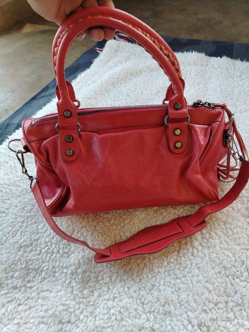 BALENCIAGA TWIGGY (Category: Luxury Bags & Wallets) located in Don Carlos. Submitted by thriftnidodong_23 (Listing ID 1470430022, Image 3). Description: leather Balenciaga "The Twiggy" 2-way motorcycle bag from the Nicolas Ghesquière era, featuring braided top handles, a detachable shoulder strap, and signature tassel fringe..