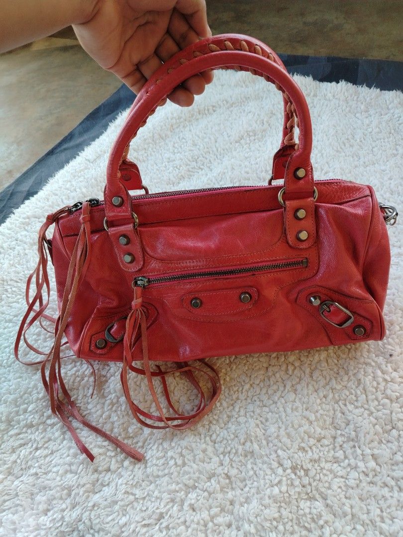 BALENCIAGA TWIGGY (Category: Luxury Bags & Wallets) located in Don Carlos. Submitted by thriftnidodong_23 (Listing ID 1470430022, Image 2). Description: leather Balenciaga "The Twiggy" 2-way motorcycle bag from the Nicolas Ghesquière era, featuring braided top handles, a detachable shoulder strap, and signature tassel fringe..