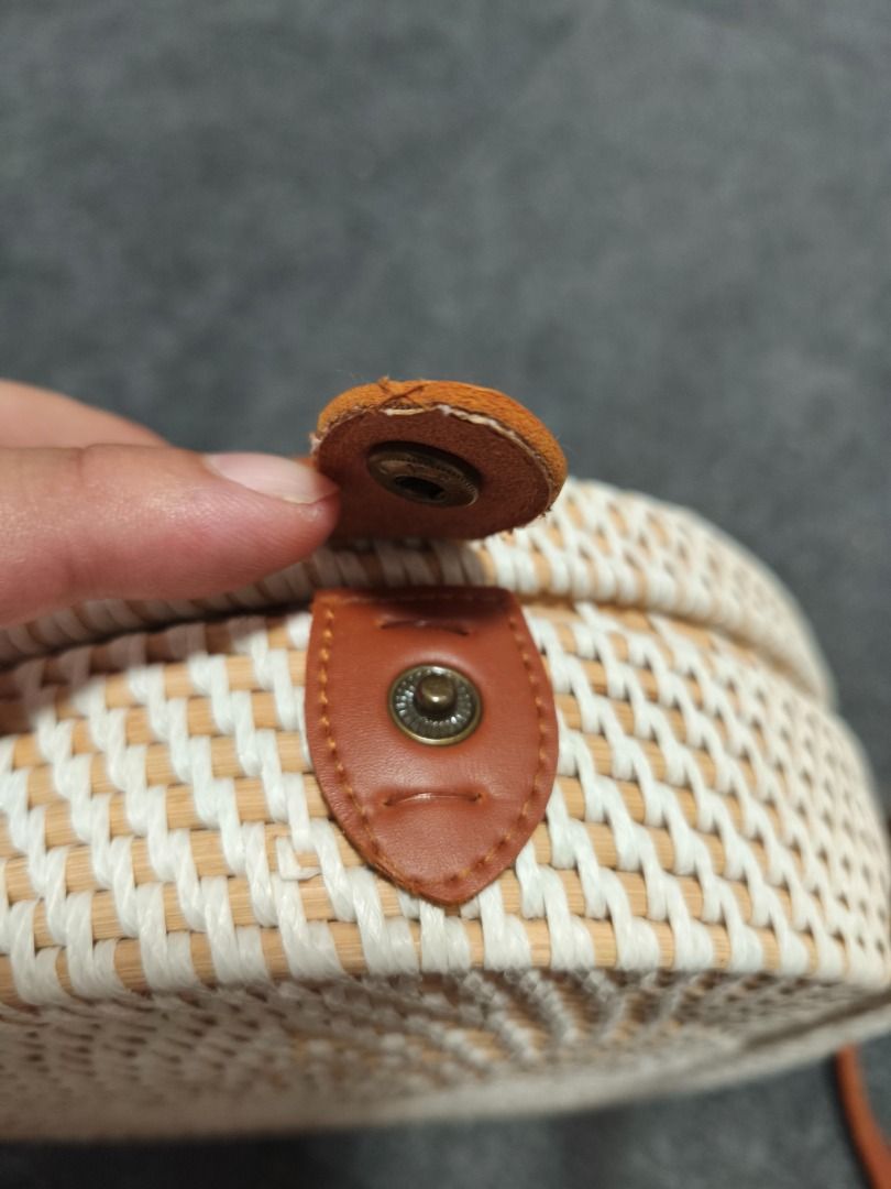 Bali handwoven round shoulder sling bag (Category: Shoulder Bags) located in Imus. Submitted by sellinthrift (Listing ID 1470440896, Image 2). Description: PRE-LOVED / DECLUTTERING SALE 🏷️ Bali handwoven round shoulder sling bag Quick Details: • Size: diameter-8inches • Condition: 9/10 • Inclusions: Bag only • Issue/Notes: Very good condition, seldom used, button is closing properly Price: ₱595+SF (Slightly negotiable for quick pickup) Pm for mo