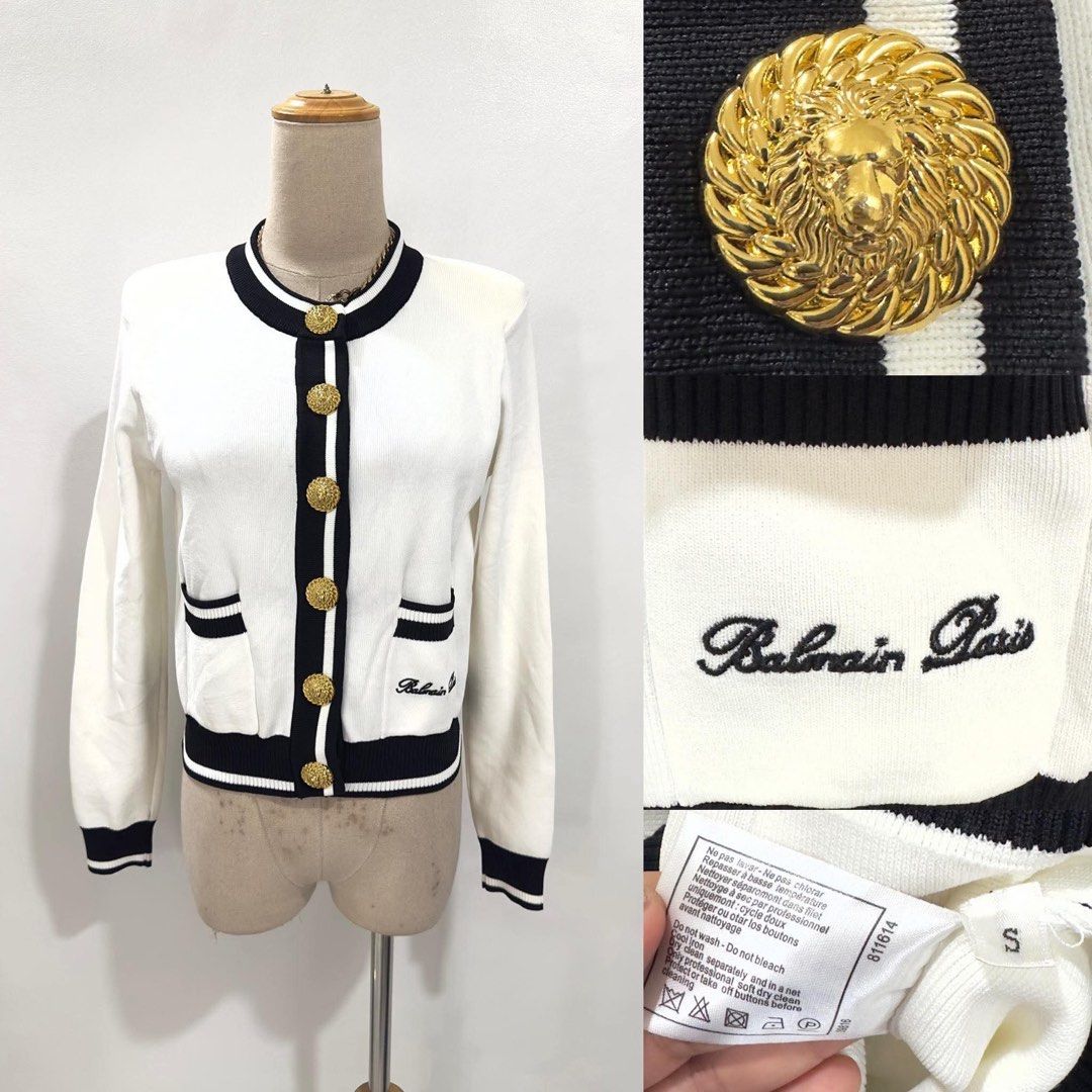 Balmain White & Black Embroidered Cardigan (Category: Coats, Jackets and Outerwear) located in Bacolod City. Submitted by bhabissagal-05763 (Listing ID 1470400162, Image 2). Description: - Brand: Balmain - Style: White and black knit cardigan with contrast trim - Size: S (tag attached) - Hardware: Signature gold-tone lion crest buttons - Details: Embroidered Balmain Paris script logo near the hem, ribbed cuffs and hem - Condition: Includes care l