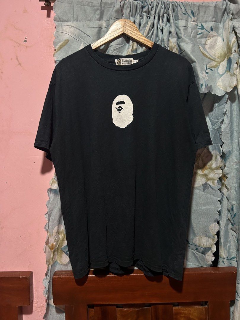 Bape Script (Category: Coats, Jackets and Outerwear) located in Rodriguez. Submitted by thriftwitharn (Listing ID 1470388033, Image 1). Description: 22 WIDHT 28 LENGHT HAS MINOR HAIRLINES, 1 PINOLE 8/10 CR.