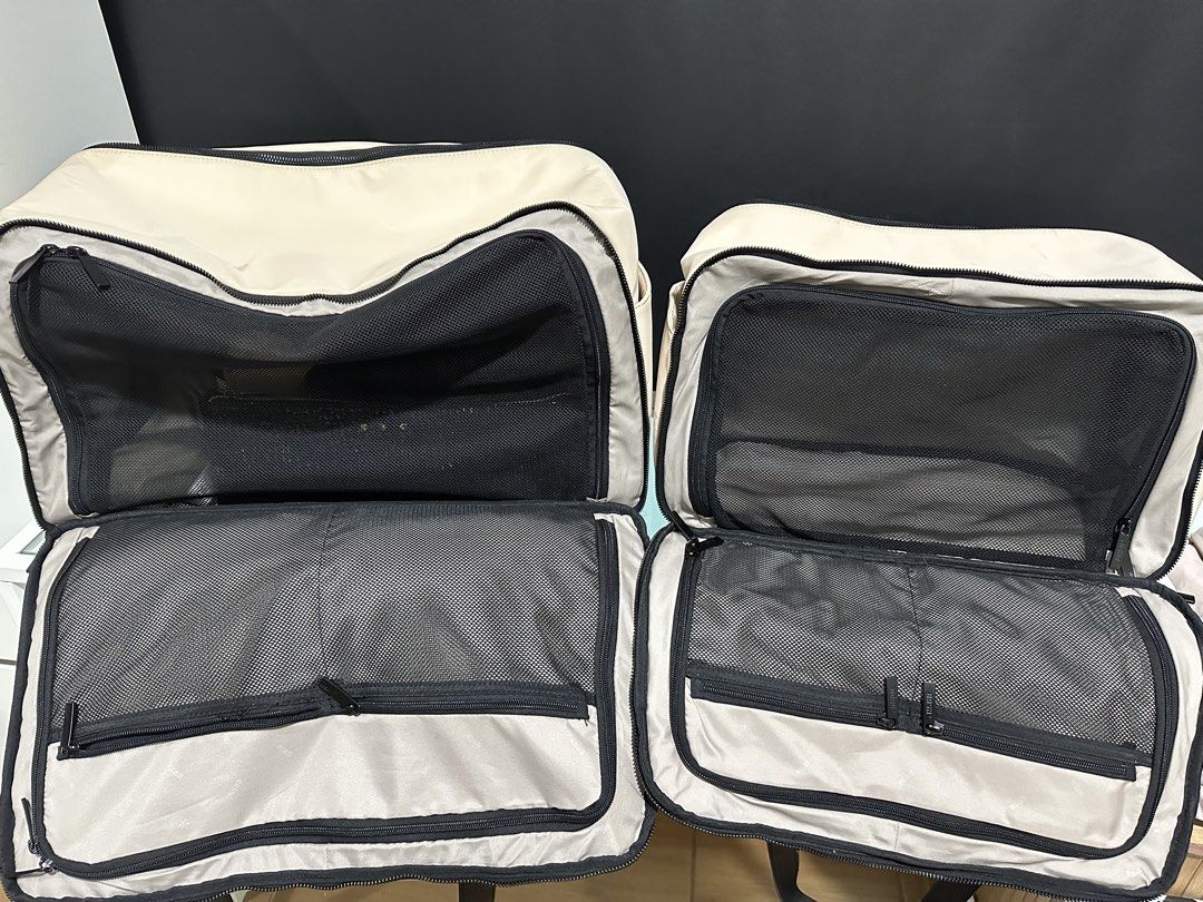 Bash Travel Duffle Bag Set with Pouch (Category: Shoulder Bags) located in Mandaluyong City. Submitted by shopkcllanillo (Listing ID 1470556582, Image 2). Description: GET BOTH FOR ₱2,500.00 - Brand/Model: Matching Bash travel set - Colorway: Cream beige with stylish black leather straps - Set Inclusions: Large duffle and mini duffle, and a small matching pouch - Interior Features: Mesh zippered compartments for easy organization - Condition: Zip