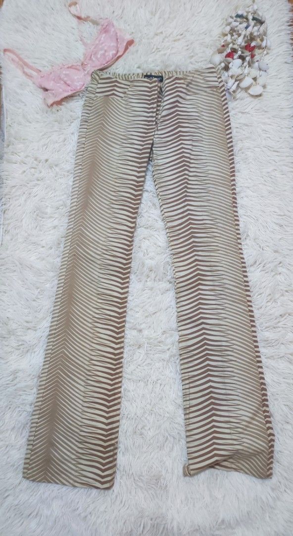 Y2k Bebe brown beige patterned flare Pants Jeans (Category: Jeans) located in San Carlos. Submitted by rae.shellection (Listing ID 1470415719, Image 1). Description: 🐚23-25 🐚 length: 38 inch 🐚no issues 🐚manage your expectations mod: J&T mop: Gcash.