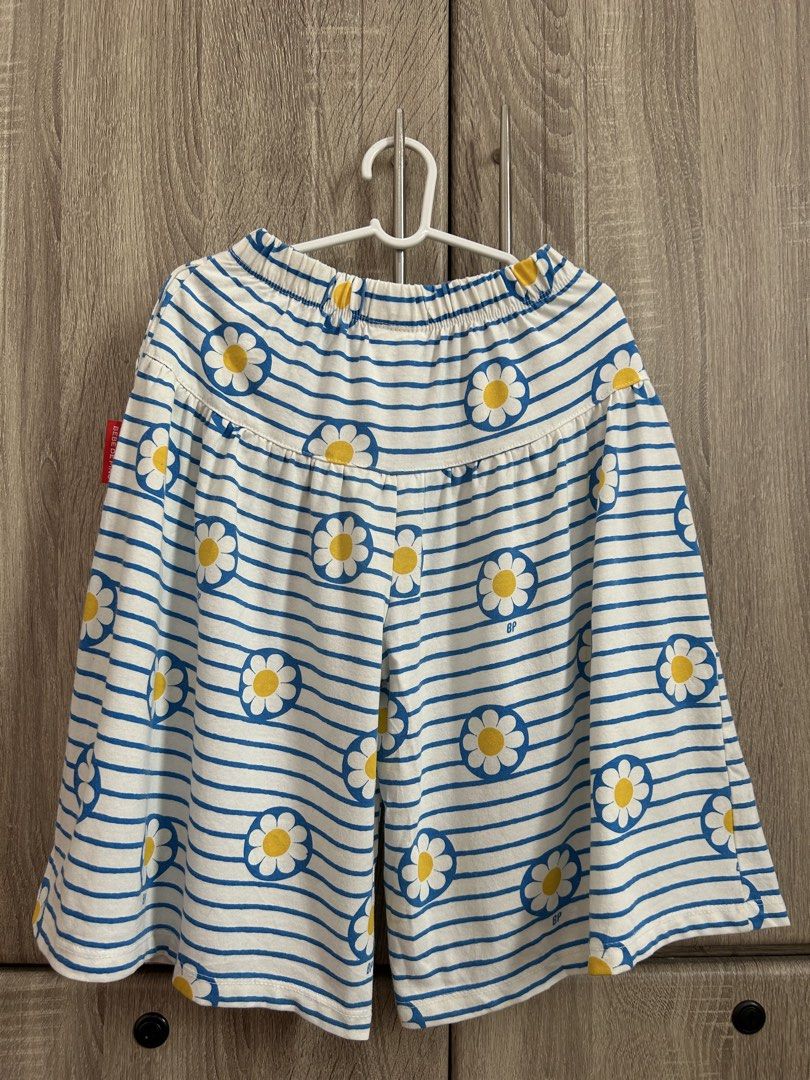 BEBE DE PINO Blue White Striped Daisy Pants (Category: Babies & Kids Fashion) located in Makati City. Submitted by michellecollado07 (Listing ID 1470440259, Image 3). Description: - Brand: BEBE DE PINO - Design: Blue and white stripes with all-over daisy flower prints and red logo patch - Waistband: Elastic with adjustable drawstring - Material: Super soft 100% cotton for all-day comfort - Fit: Perfect for everyday play and casual wear 110 on tag