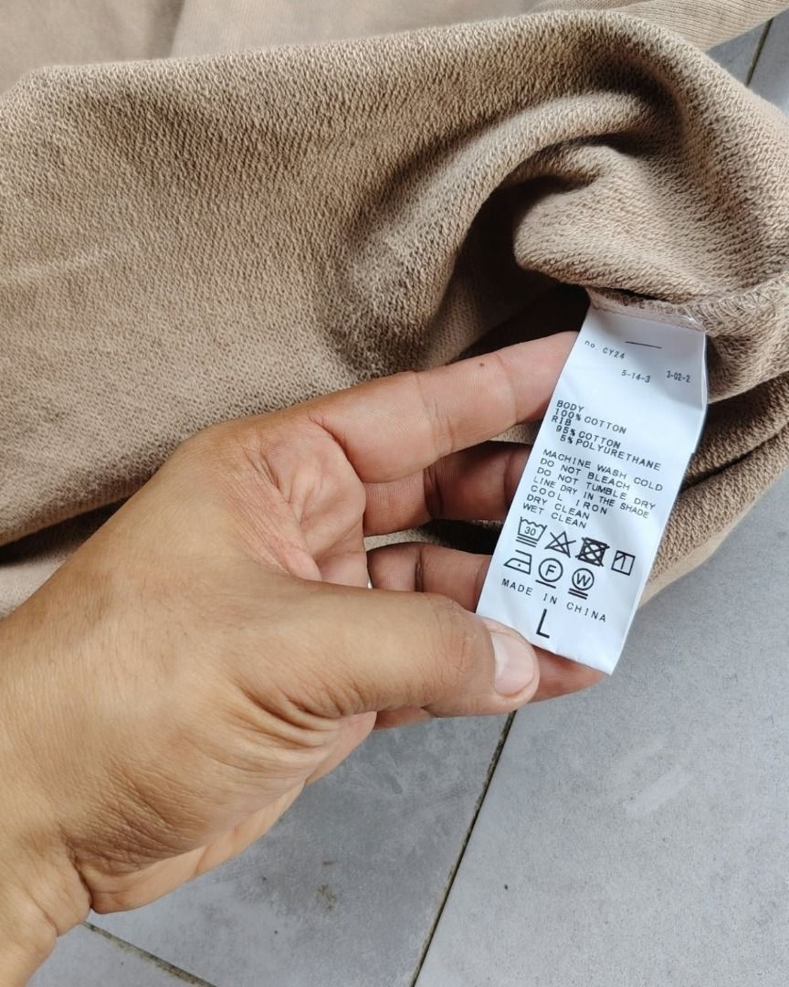 Beige Long Sleeve Crewneck Sweatshirt (Category: Longsleeves) located in Bauang. Submitted by wornskript (Listing ID 1470480772, Image 3). Description: Boxy Drop-Shoulder Long Sleeve Shirt Size : Large Dimes : 25" x 27.5" - Color: Plain beige - Material: Thick, high-quality cotton - Fit: Relaxed with a trendy drop-shoulder design - Details: Ribbed crewneck, cuffs, and hem - Style: Minimalist, basic, and versatile for layering or casual daily wear