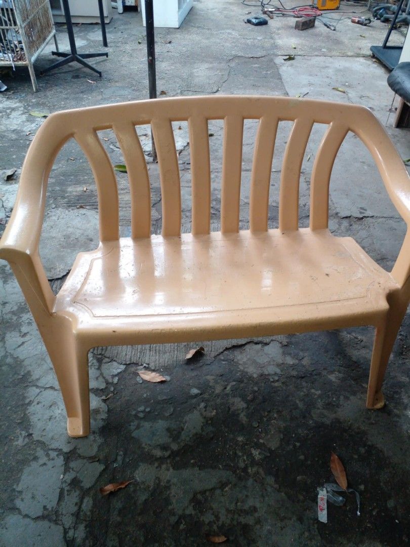 Beige plastic bench outdoor seating (Category: Chairs) located in Manila. Submitted by wisegem-231b (Listing ID 1470394825, Image 2). Description: - 2-seater beige plastic bench - Features a comfortable slatted backrest and armrests - Sturdy construction yet lightweight for easy moving - Low maintenance and easy to wipe clean - Ideal for porches, balconies, and backyards.