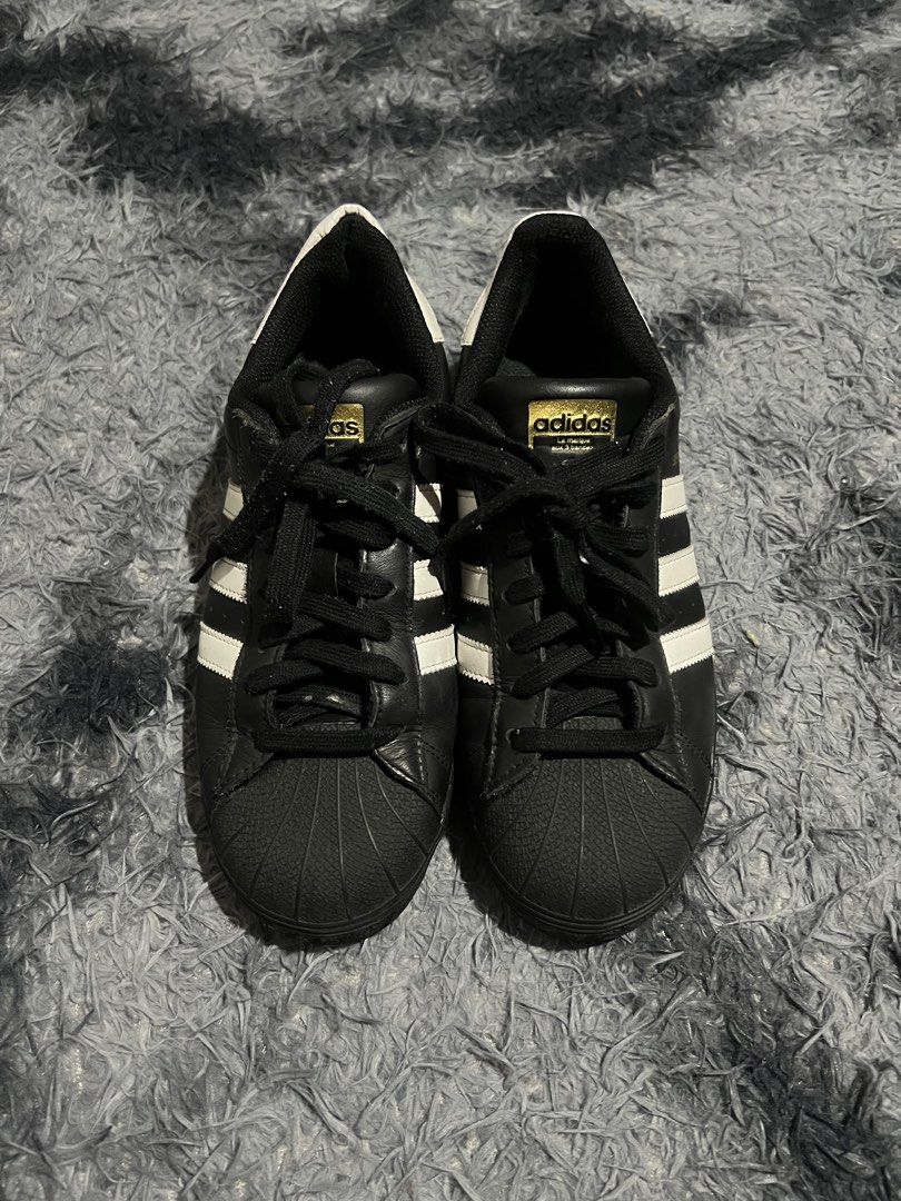 Black adidas superstar shoes (Category: Sneakers) located in Cebu City. Submitted by drip_block (Listing ID 1470381145, Image 1). Description: Size 7-1/2 US.