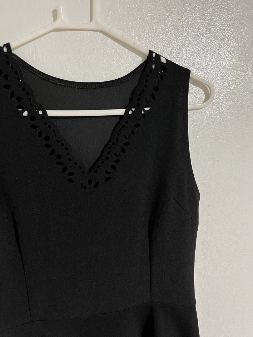 Black A-line Sleeveless Dress (Category: Dresses) located in Cabuyao City. Submitted by rdtrmt (Listing ID 1470440274, Image 2). Description: - Color: Black - Design: Sleeveless with a fitted bodice, waist seam, and flared skirt - Details: Elegant laser-cut scalloped pattern along the V-neckline and bottom hem - Back: Simple scoop back design - Versatility: Perfect for casual outings or dinners - Condition: still in good condition.