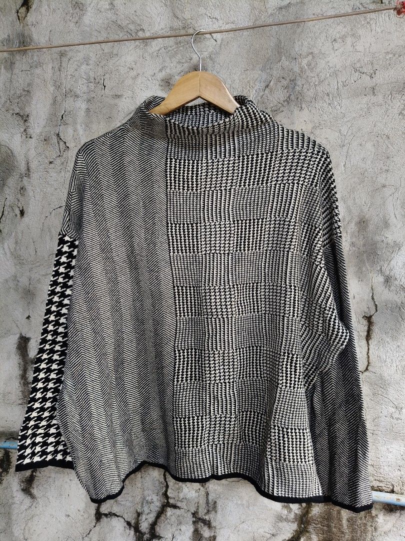 Black and White Patterned Mock Neck Knit Sweater (Category: Longsleeves) located in Makati City. Submitted by thriftersmakati (Listing ID 1470387898, Image 1). Description: - Design: Black and white patterned knit with houndstooth, chevron, and plaid panels - Fit: Oversized boxy fit with dropped shoulders for a relaxed look - Details: Mock neck collar, ribbed hem, and cuffs that hold their shape - Comfort: Super soft, warm, and cozy material idea