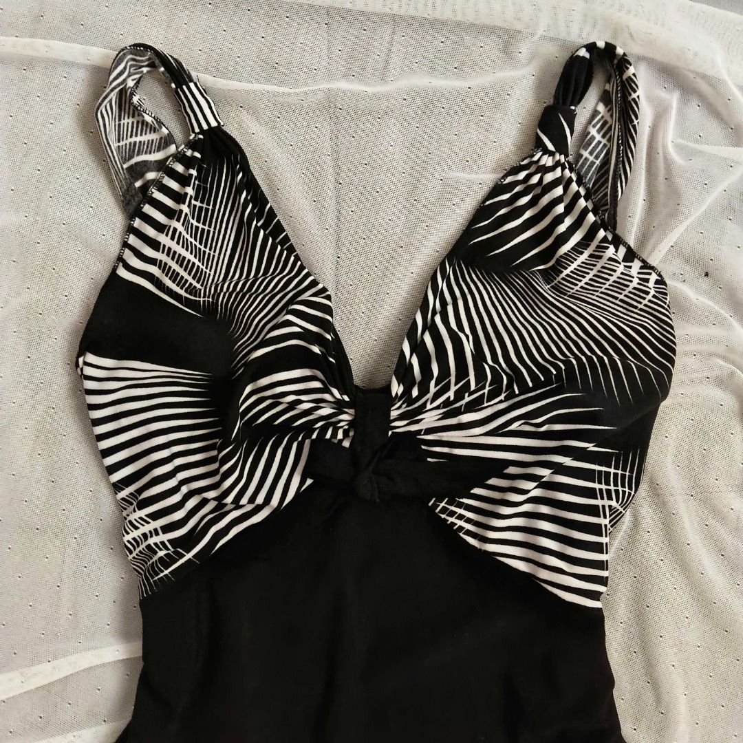 Black and white patterned swimsuit peplum top (Category: Bikinis & Swimsuits) located in Manila. Submitted by electricpetals (Listing ID 1470476056, Image 2). Description: - Design: Black and white abstract pattern on the chest with a chic ruffled bottom hem - XS-M .