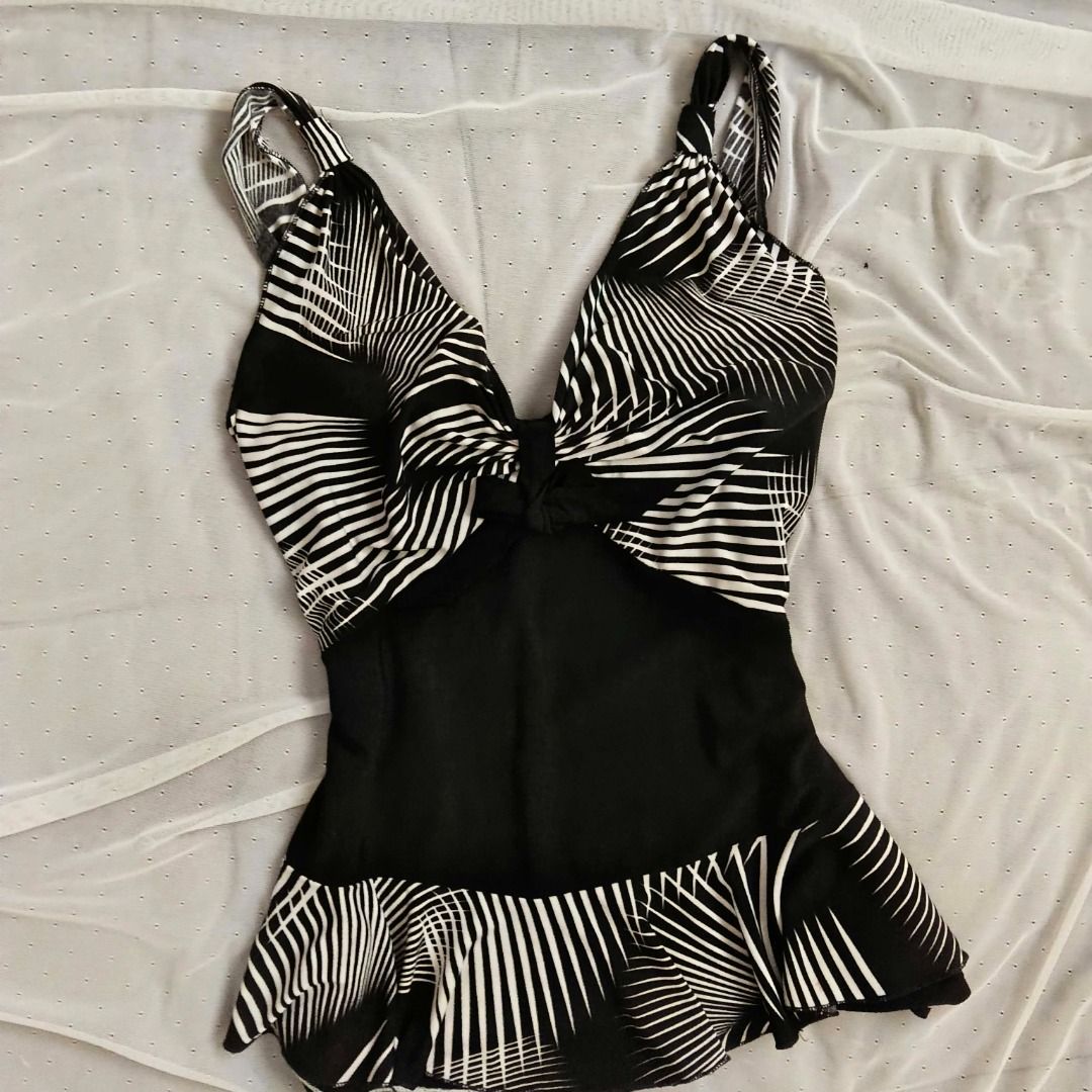Black and white patterned swimsuit peplum top (Category: Bikinis & Swimsuits) located in Manila. Submitted by electricpetals (Listing ID 1470476056, Image 3). Description: - Design: Black and white abstract pattern on the chest with a chic ruffled bottom hem - XS-M .