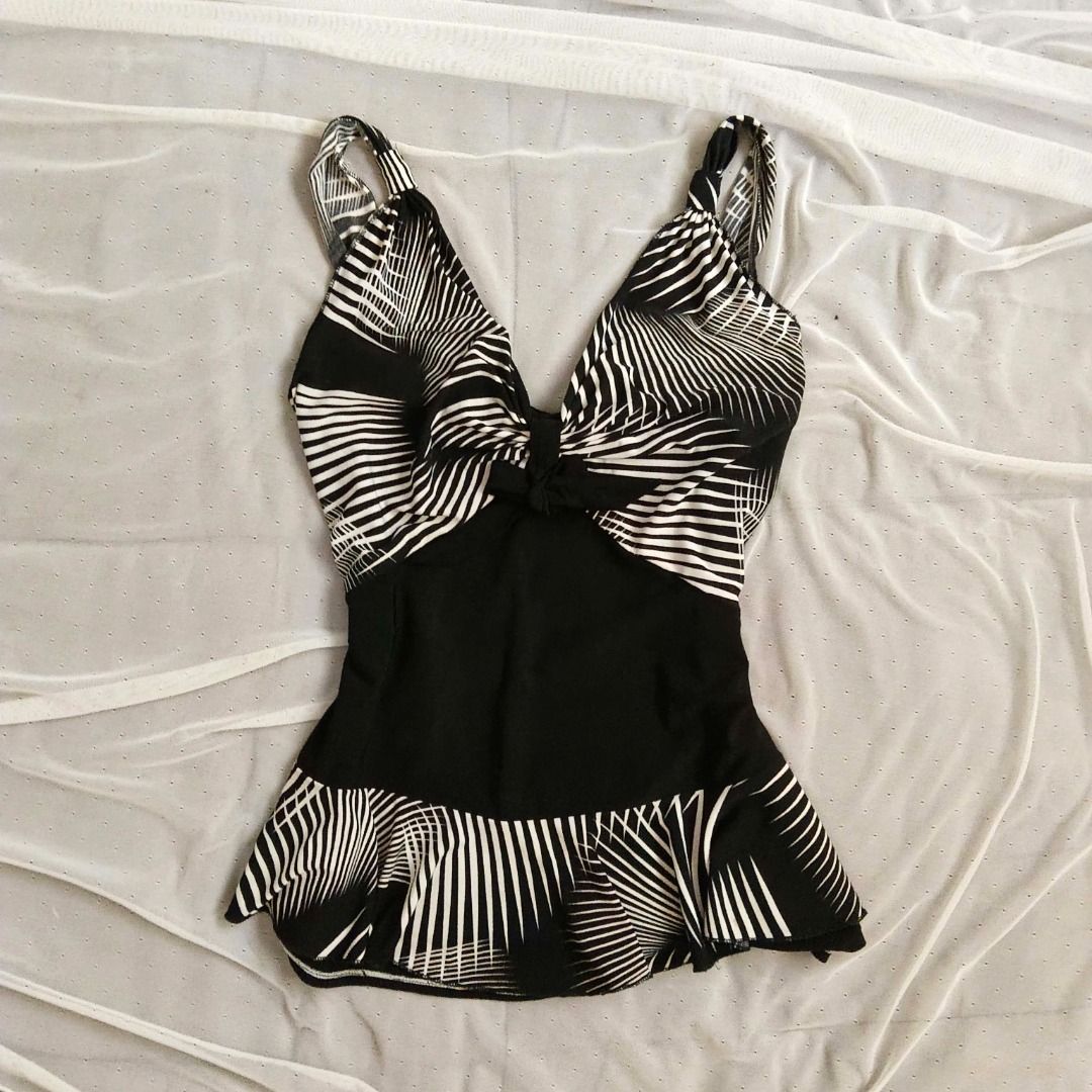 Black and white patterned swimsuit peplum top (Category: Bikinis & Swimsuits) located in Manila. Submitted by electricpetals (Listing ID 1470476056, Image 1). Description: - Design: Black and white abstract pattern on the chest with a chic ruffled bottom hem - XS-M .