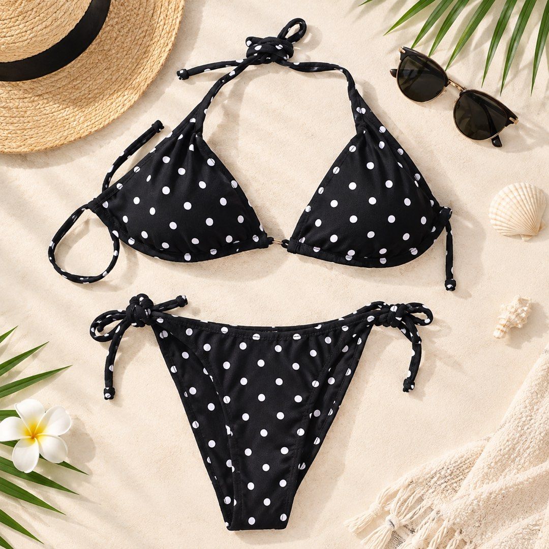 Black and White Polka Dot Bikini Set (Category: Bikinis & Swimsuits) located in Cabanatuan. Submitted by wantsomethrifts (Listing ID 1470531911, Image 1). Description: - Design: Cute black bikini with all-over white polka dots - Top: Halter neck with adjustable sliding triangle cups - Bottoms: Matching low-rise with adjustable side tie closures - Comfort: Soft, stretchy fabric, fully lined inside - Perfect for: Beach trips, pool lounging, and tro