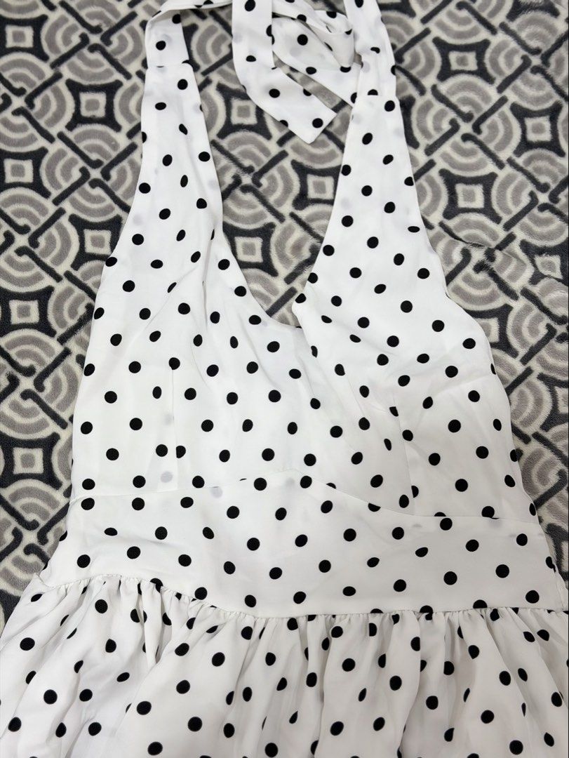 Black and White Polka Dots Halter Top Bundle (Category: Sleeveless) located in Cavite. Submitted by dreampolice (Listing ID 1470414829, Image 3). Description: ✴︎ strictly selling as a set/bundle ✴︎ only wore the black top once, never wore the white one ✴︎ bought from tiktok shop.