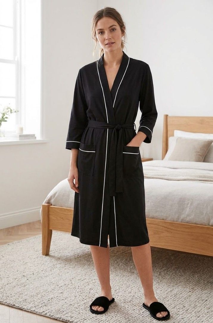 Black Bathrobe for Women (Category: Coats, Jackets and Outerwear) located in Las Pinas. Submitted by apples_here (Listing ID 1470522580, Image 1). Description: New Fits: Sam ml to Medium Back and White Light weight Sleeves (3/4) Middie as seen on the Model.