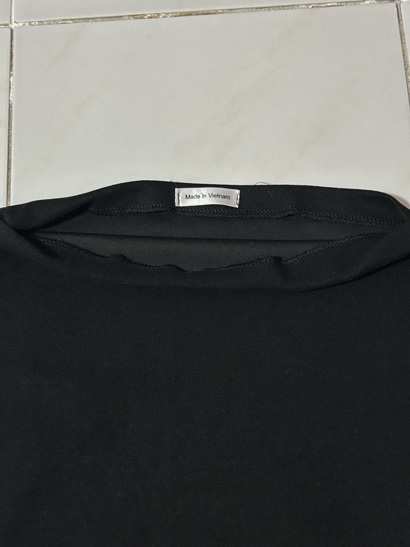 Black Boat Neck Asymmetrical Top (Category: Blouses) located in Manila. Submitted by viyyu (Listing ID 1470414568, Image 2). Description: •Boat neckline, asymmetrical one shoulder •Fitted cut through the waist •Clean fabric with neat stitching along hems •Origin: Made in Vietnam.
