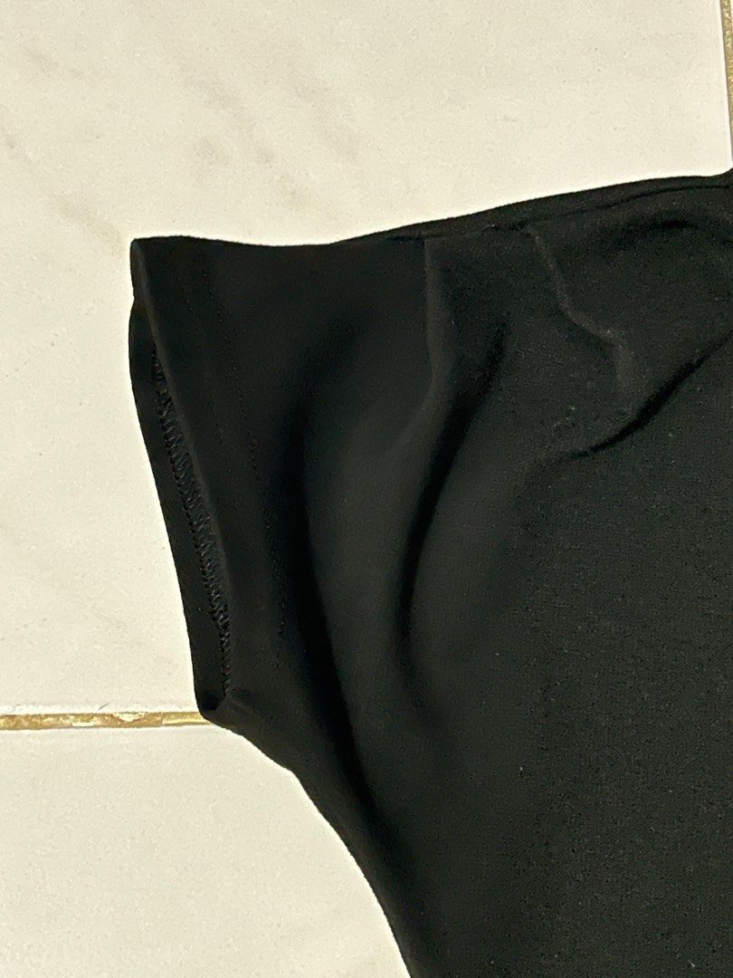 Black Boat Neck Asymmetrical Top (Category: Blouses) located in Manila. Submitted by viyyu (Listing ID 1470414568, Image 3). Description: •Boat neckline, asymmetrical one shoulder •Fitted cut through the waist •Clean fabric with neat stitching along hems •Origin: Made in Vietnam.