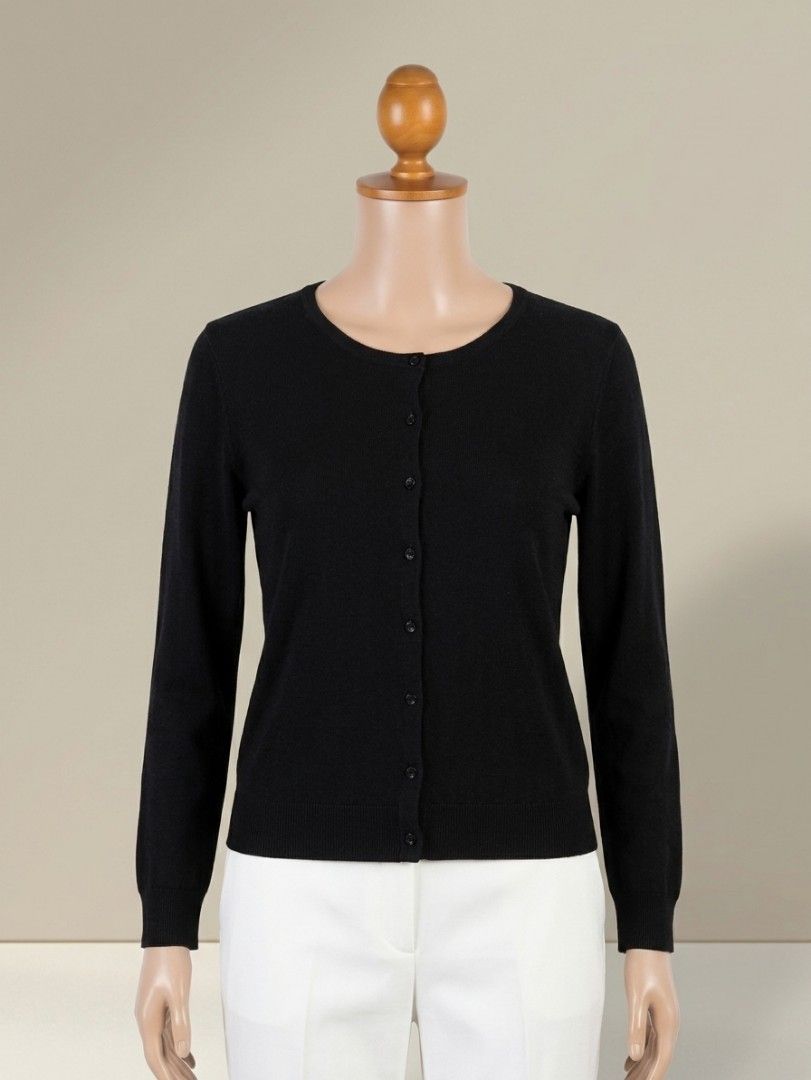 Black Crewneck Button Down Knit Cardigan (Category: Coats, Jackets and Outerwear) located in Quezon City. Submitted by dannikkishoppe2 (Listing ID 1470478571, Image 1). Description: Black Crewneck Button Down Knit Cardigan‼️₱300‼️ • Style & Fit: Timeless slim-fit crewneck cardigan with long sleeves and a neat button-front placket. • Material & Texture: Soft, lightweight fine-gauge knit fabric providing comfortable stretch and breathable warmth. •
