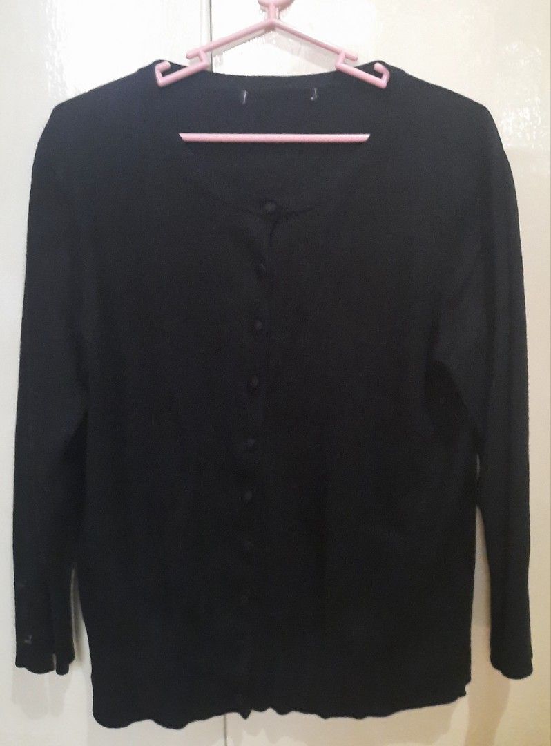 Black Crewneck Button Down Knit Cardigan (Category: Coats, Jackets and Outerwear) located in Quezon City. Submitted by dannikkishoppe2 (Listing ID 1470478571, Image 2). Description: Black Crewneck Button Down Knit Cardigan‼️₱300‼️ • Style & Fit: Timeless slim-fit crewneck cardigan with long sleeves and a neat button-front placket. • Material & Texture: Soft, lightweight fine-gauge knit fabric providing comfortable stretch and breathable warmth. •