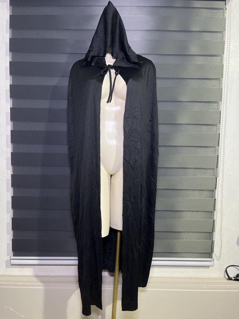 Black Hooded Cape Costume Cloak (Category: Coats, Jackets and Outerwear) located in Caloocan City. Submitted by unicakczxc (Listing ID 1470453403, Image 1). Description: One size fits all 199 ONLY - Color: Black - Material: Lightweight satin-like fabric with natural wrinkles - Closure: Fabric ties at the front neck - Fit: Long length, covers from head to floor on most adults - Versatile: Great for Halloween costumes, cosplay, and quick outfit ove