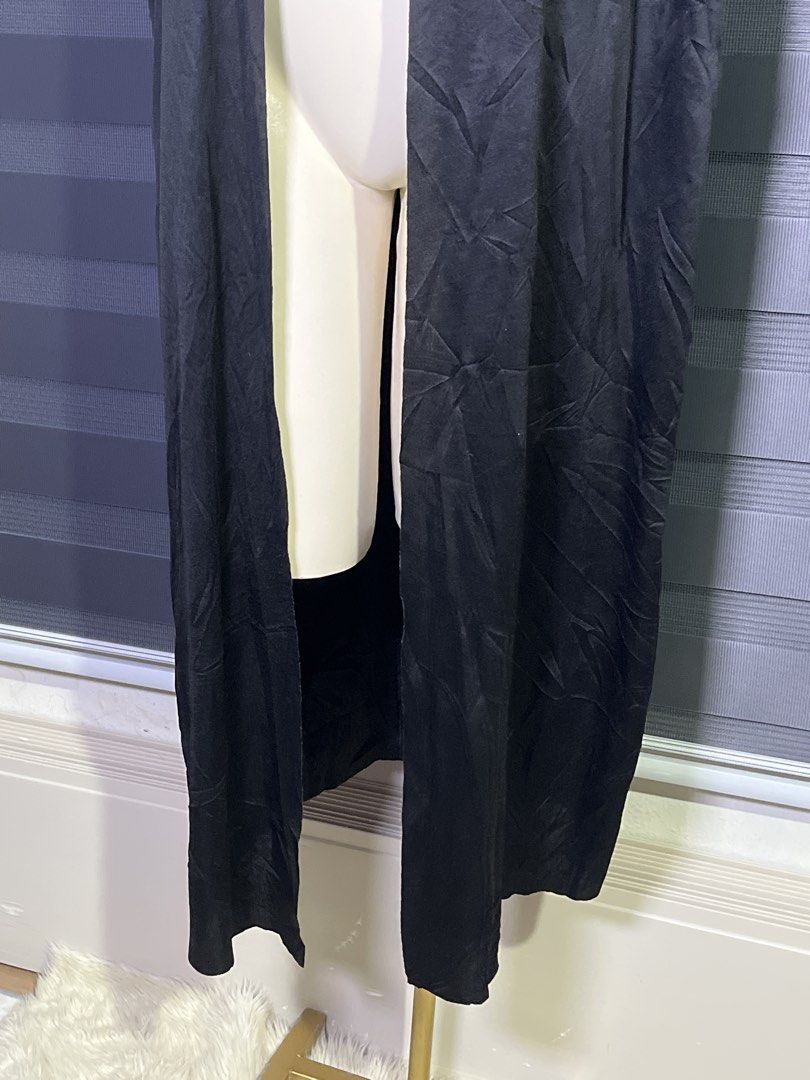 Black Hooded Cape Costume Cloak (Category: Coats, Jackets and Outerwear) located in Caloocan City. Submitted by unicakczxc (Listing ID 1470453403, Image 3). Description: One size fits all 199 ONLY - Color: Black - Material: Lightweight satin-like fabric with natural wrinkles - Closure: Fabric ties at the front neck - Fit: Long length, covers from head to floor on most adults - Versatile: Great for Halloween costumes, cosplay, and quick outfit ove