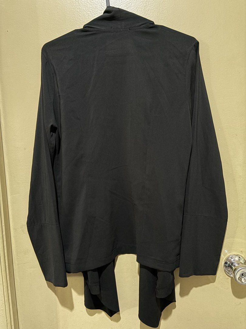 Black Long Sleeve Draped Open Front Cardigan / Coat (Category: Coats, Jackets and Outerwear) located in San Pedro. Submitted by iarruh (Listing ID 1470403092, Image 2). Description: - Color: Solid black - Style: Open front with stylish draped lapels - Material: Lightweight and comfortable fabric - Sleeves: Long with wide cuffs - Details: Clean stitching throughout - Perfect for effortless everyday layering over shirts or dresses.