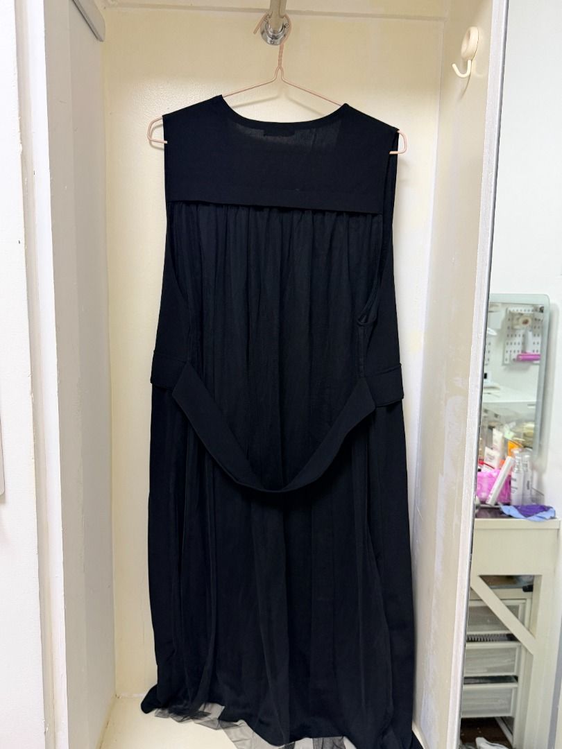 Black long vest sleeveless outer layer (Category: Sleeveless) located in Makati City. Submitted by yuriandcole (Listing ID 1470382819, Image 2). Description: - Color: Black - Style: Long sleeveless vest with open front and front pocket flaps - Material: Lightweight, ideal for layering over tops and dresses - Condition: Brand new with original store tag still attached on the neckline.