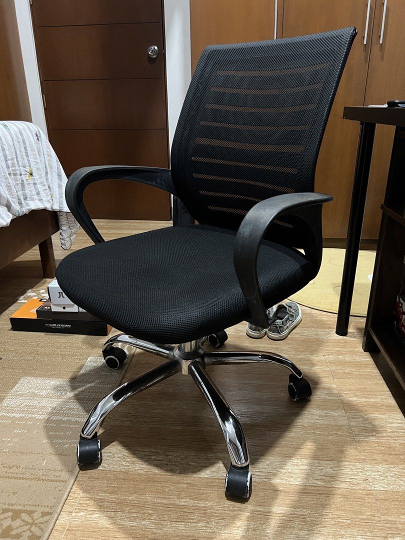Black Mesh Office Chair with Wheels (Category: Office Furniture & Fixtures) located in Las Pinas. Submitted by thethirdadriano (Listing ID 1470415941, Image 2). Description: Used Black office chair Condition: 7.5/10 with faded arm rests, mesh is still good RFS: Upgraded to gaming chair .