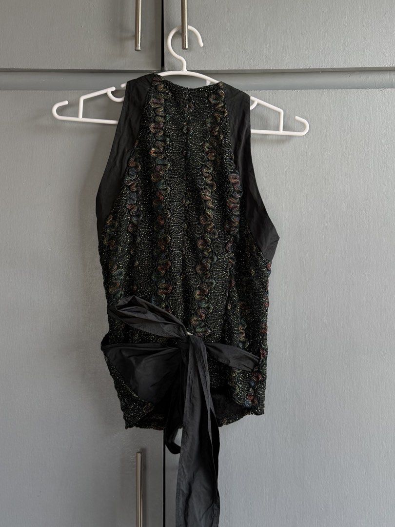 Black Metallic/Lace Sleeveless Wrap Top (Category: Sleeveless) located in San Juan City. Submitted by itemsfromkam (Listing ID 1470452879, Image 2). Description: •fits S-L • v-neck wrap top, shimmery/metallic, a bit sheer •unique, lightweight, thrifted in bangkok .