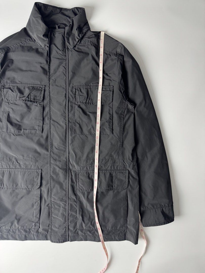 Black multi-pocket utility zip jacket (Category: Coats, Jackets and Outerwear) located in Cavite. Submitted by dracokidstuff (Listing ID 1470393927, Image 3). Description: - Color: Solid Black - Style: Utility jacket with multiple front cargo pockets - Closure: Full zip with snap-button storm flap and high collar - Material: Durable outdoor fabric - Measurements: Chest width ~23", Length ~28.5", Sleeve length ~25" - Condition: Brand new / Excelle