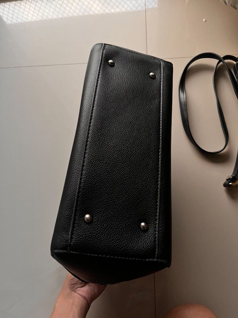 Black Pebbled Leather Handbag with Strap (Category: Luxury Bags & Wallets) located in Macabebe. Submitted by cheeseoreo (Listing ID 1470443159, Image 3). Description: in good condition, no peeling 📍Pampanga 🛻 J&T.