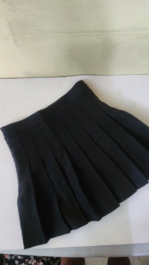 Black Pleated Mini Skirt (Category: Skirts) located in Quezon City. Submitted by amenohana (Listing ID 1470357036, Image 1). Description: - Color: Classic solid black - Design: Neat box pleats all around - Comfort: Fully lined interior fabric - Versatility: Pairs easily with any top - Style: Casual mini skirt, great for everyday rotation.