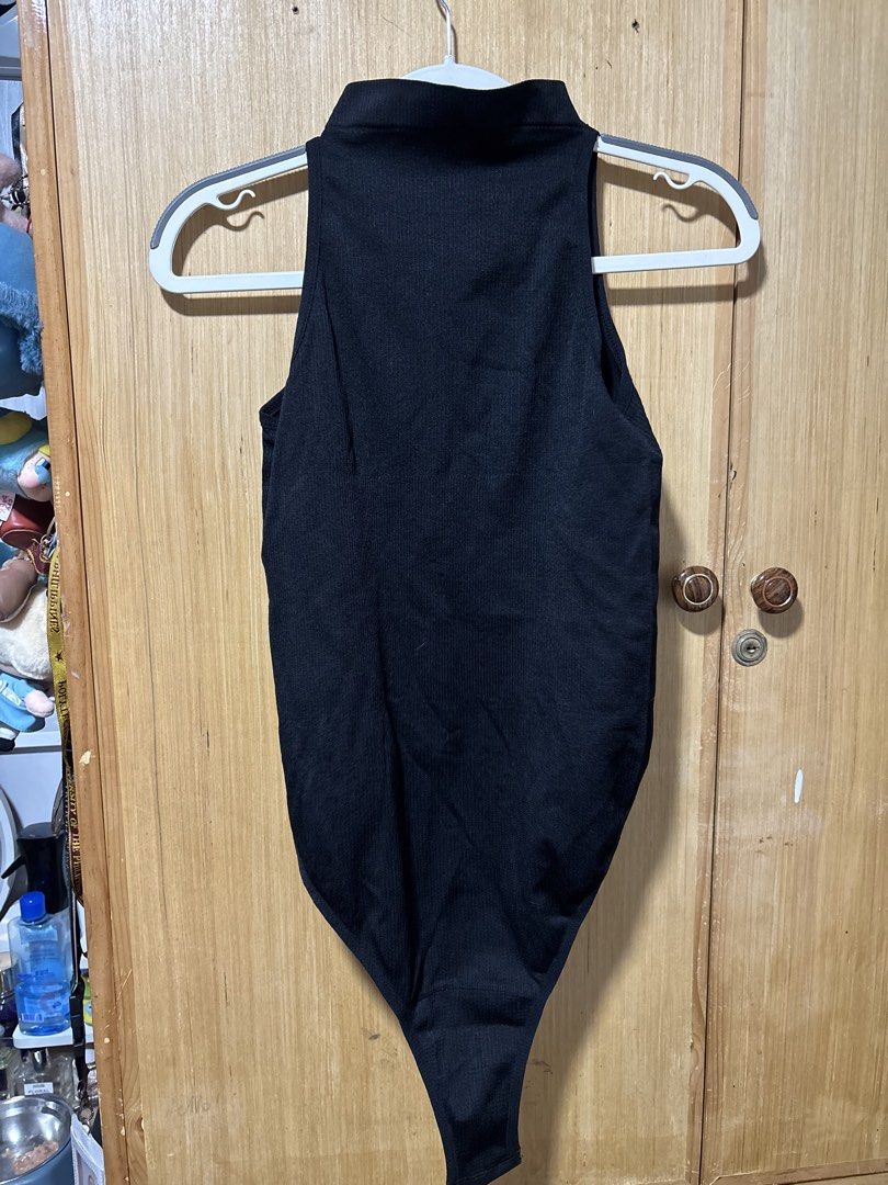 Black Ribbed High Neck Vest Bodysuit Size L (Category: Sleeveless) located in Taguig. Submitted by pauu1234 (Listing ID 1470404263, Image 1). Description: 📌 Never been used 📌 Fits M-L body frames Original price: ₱182 - payment first basis - next day pick up (contact seller if needed immediately) - taguig area 😊.