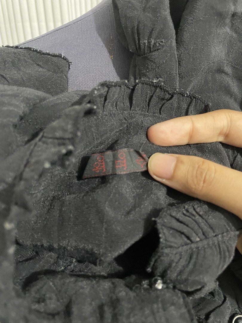 Black Ruffled Polo Top (Category: Others Tops) located in Tuguegarao City. Submitted by ziggerryy (Listing ID 1470522466, Image 3). Description: No flaws. No holes Fits S-M Semi Sheer Material.