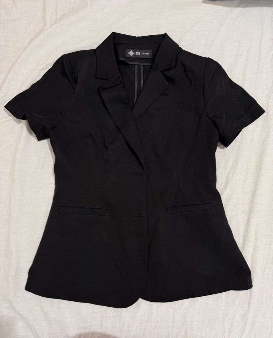 Black short sleeve blazer size (Category: Coats, Jackets and Outerwear) located in Santa Rosa. Submitted by pauiofficial (Listing ID 1470357685, Image 1). Description: - Color: Black - Style: Short sleeve blazer with button closure and two front pockets - Size: 2XL on tag but only fits on 32 to 33inches bust size - Material/Feature: Lightweight, perfect for office wear - Condition: Clean, worn only thrice for a corporate event and client meetings