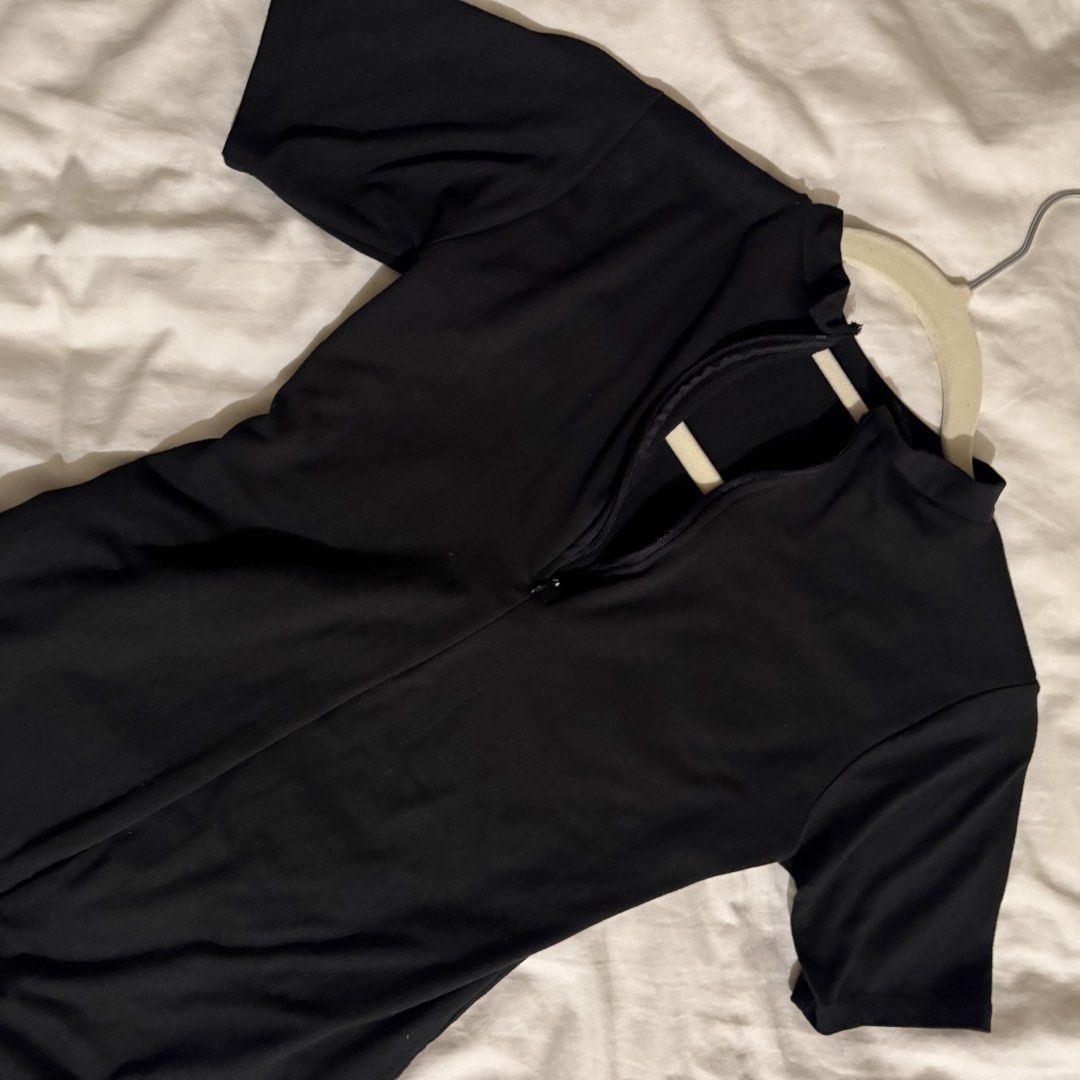 Black Short Sleeve Front Zip Romper Jumpsuit (Category: Jumpsuits) located in Quezon City. Submitted by ianne.declutter (Listing ID 1470370669, Image 2). Description: - Color: Black - Style: Short sleeve romper / jumpsuit with mock neckline - Closure: Front half-zip - Fit: Form-fitting with short pant legs and stretchy fabric for ultimate comfort - Occasion: Great for casual daily wear or going out.