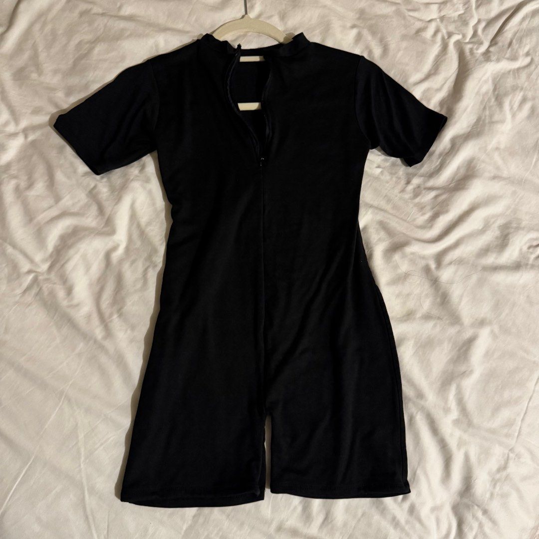 Black Short Sleeve Front Zip Romper Jumpsuit (Category: Jumpsuits) located in Quezon City. Submitted by ianne.declutter (Listing ID 1470370669, Image 1). Description: - Color: Black - Style: Short sleeve romper / jumpsuit with mock neckline - Closure: Front half-zip - Fit: Form-fitting with short pant legs and stretchy fabric for ultimate comfort - Occasion: Great for casual daily wear or going out.