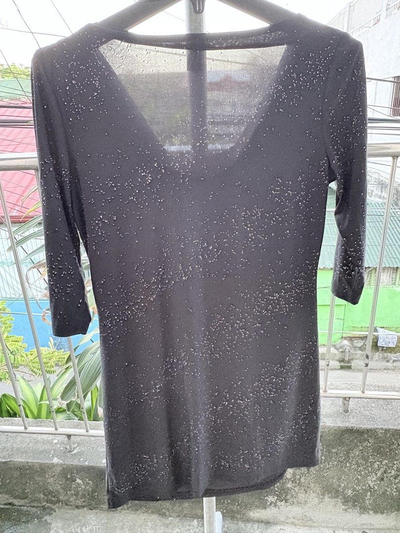 Black Sparkly Top With Cowl Neck (Category: Blouses) located in Cavite. Submitted by earthread (Listing ID 1470454101, Image 2). Description: - Color/Design: Black with all-over silver glitter dots - Neckline: Cowl front with a chic V-back - Sleeves: Three-quarter length - Fabric: Lightweight and slightly sheer near the neckline - Fit: Midi length with a straight hem - Best for: Parties, night outs, and events .