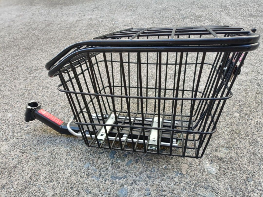 Black Wire Bicycle Basket with Handlebar Mount (Category: Bicycles) located in Quezon City. Submitted by cataleya0723 (Listing ID 1470356506, Image 3). Description: - Sturdy black wire basket for bicycles - Includes metal mounting bracket for handlebars - Heavy-duty metal mesh with reinforced base rails - Open top design for easy loading and unloading - Matte black finish, clean condition with no rust or damage.