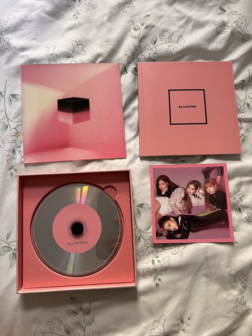 Blackpink Square Up Album (Category: CDs & DVDs) located in Makati City. Submitted by _euphoriayn (Listing ID 1470556503, Image 2). Description: - Official BLACKPINK Square Up Album (Pink Version) - Includes original pink outer box with black cube graphic - Complete inclusions: Photobook, CD, and member photocard insert - Well-kept and stored in original packaging - Perfect addition to any BLINK collection - DM for more pictures or inquiries! RFS